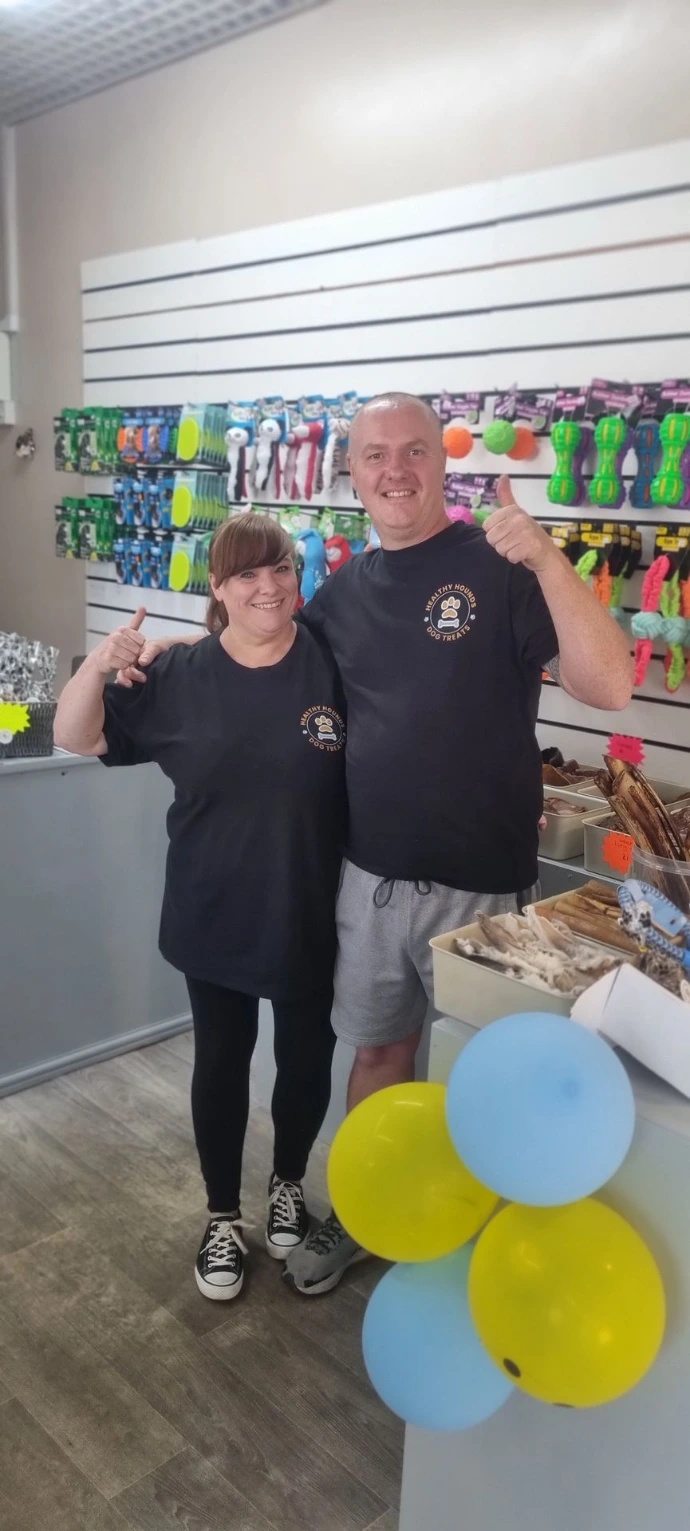 Independent pet shop owners at Healthy Hounds Castleford, specializing in raw dog food and natural treats